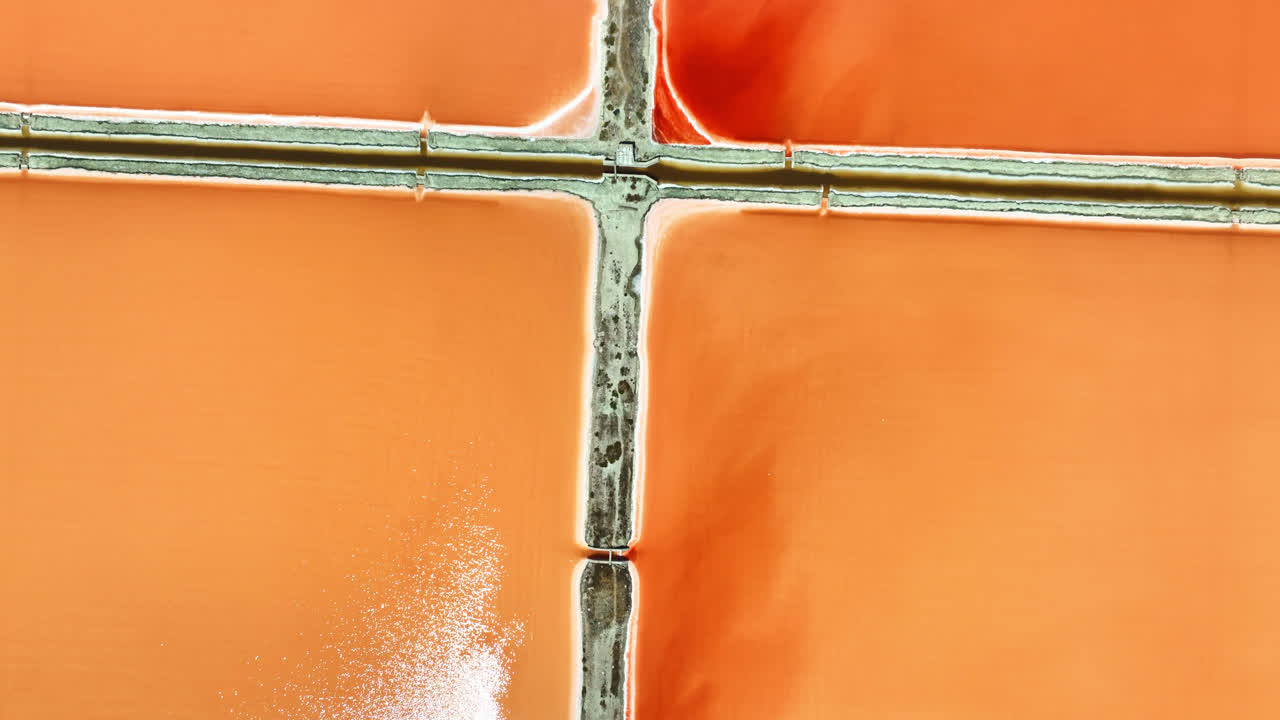 Aerial View of Vibrant Pink Salt Evaporation Ponds