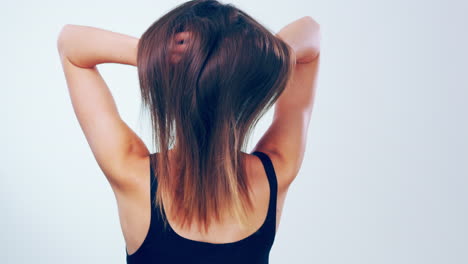 beauty, hair and back of woman in studio