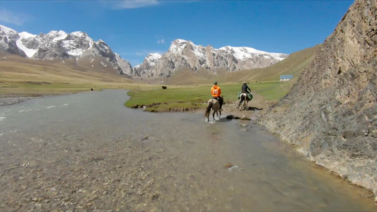 Incredible Beautiful Horse riding in Kyrgyzstan. Incredible landscapes. Mountains alpines lakes and rivers. Amazing view 04