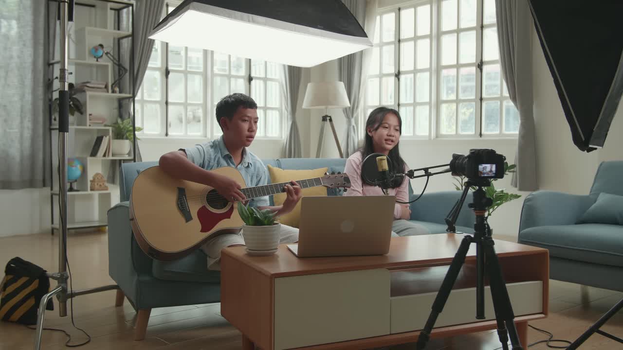 Kids Singing and Playing Guitar at Home