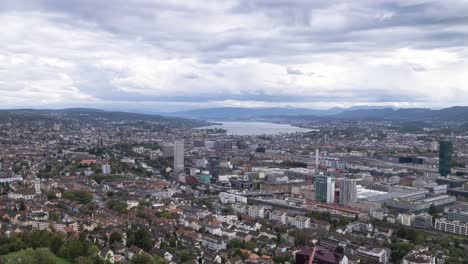 Left-to-right-pan-timelapse-over-Zurich-on-a-moody-and-cloudy-day,-Switzerland