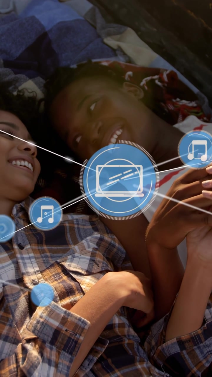 Vertical video: Right user holding phone starting blue HUD icons with white lines pair sharing tech