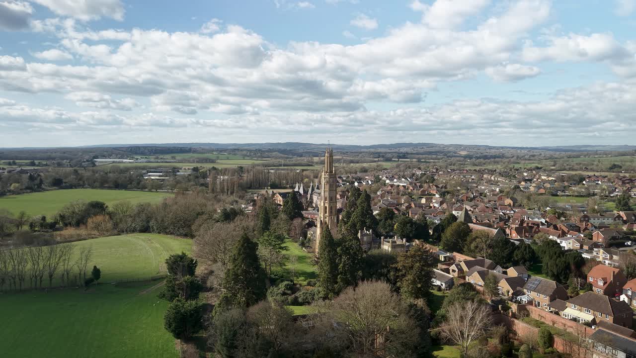 Drone view of Hadlow Tower and surrounding English community highlighting heritage site, England