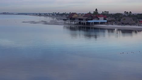 A-hotel-sits-along-a-vast-open-bay-of-ocean-or-tidal-bay-near-Tampa-Florida