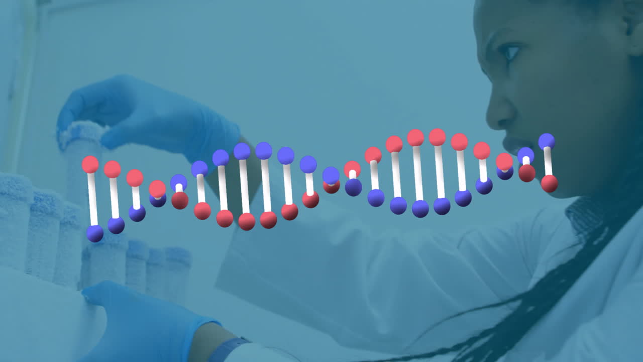 Animation of dna strand over african american female scientist working in lab