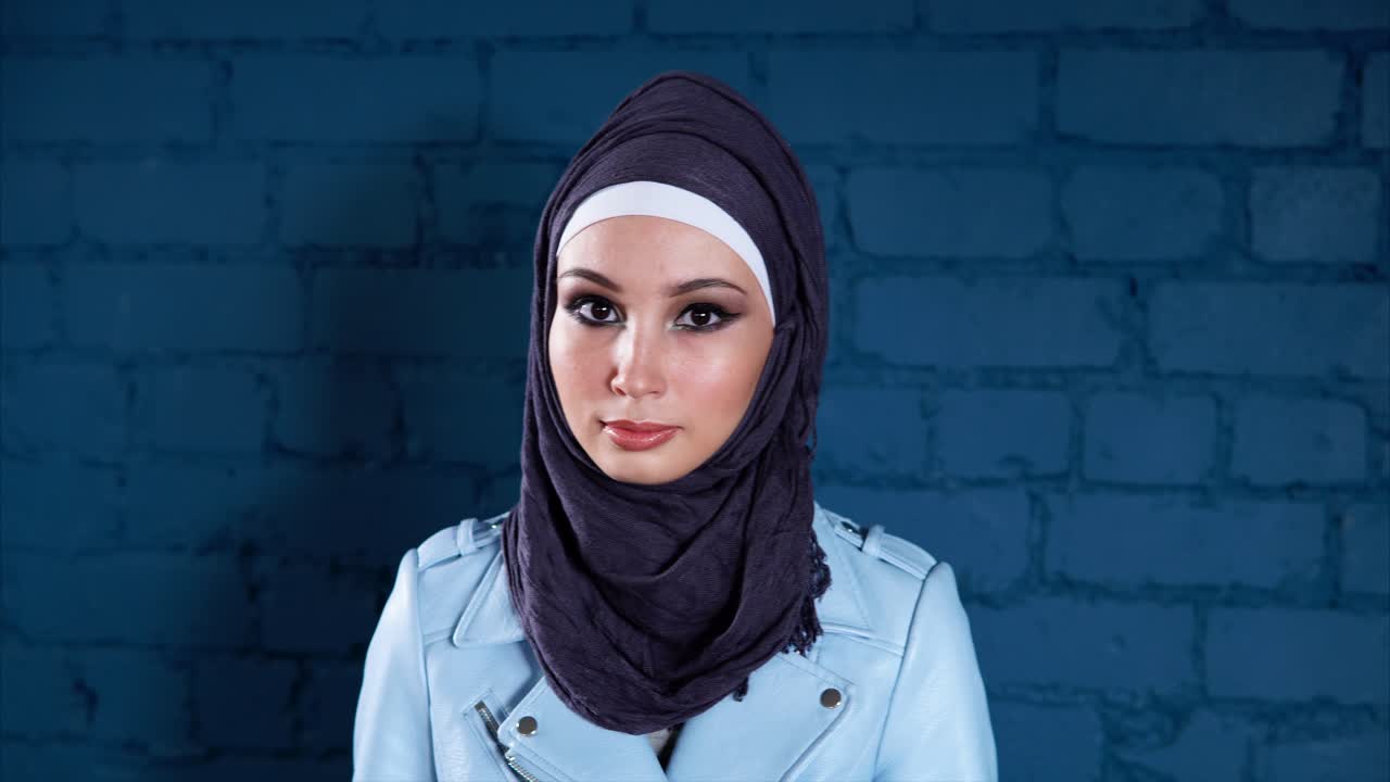 Woman in Hijab and Light Blue Jacket
