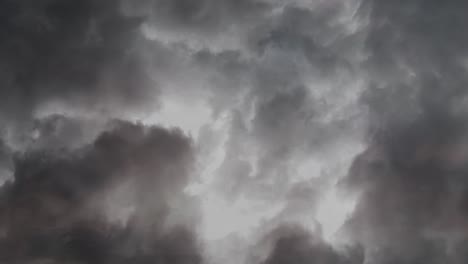 gray-clouds-in-dark-sky-and-thunderstorm