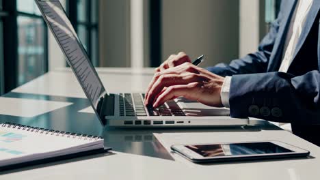 businessman working on laptop in modern office