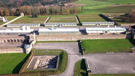 mauthausen, upper austria - a panoramic perspective of the mauthausen concentration camp - aerial pan right