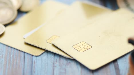 gold credit cards and coins