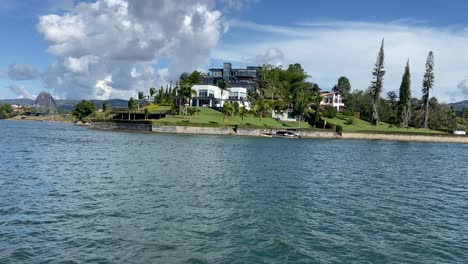 luxurious mansions on the shores of guatape reservoir in colombia