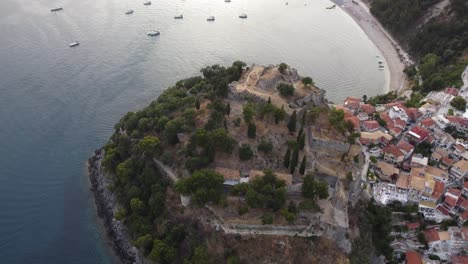 parga greek town coastline at the ionian coast with chapel of the assumption of the virgin, aerial view