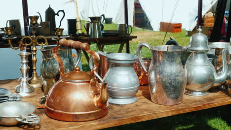 set of antique dishes on a street sale