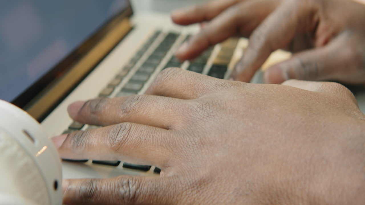 African American Man Working on Laptop