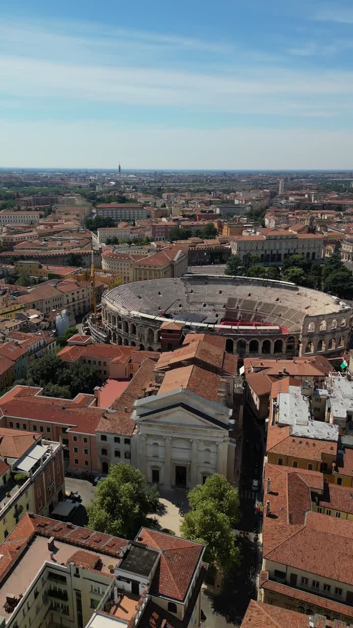 Arena di Verona well-preserved Roman amphitheater Italy landmark, aerial drone vertical video