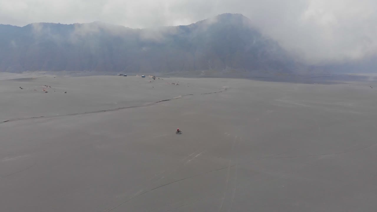 Bromo's motorcycle in sandy dust. Indonesia, East Java