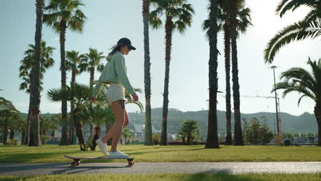 woman skateboarding in a park