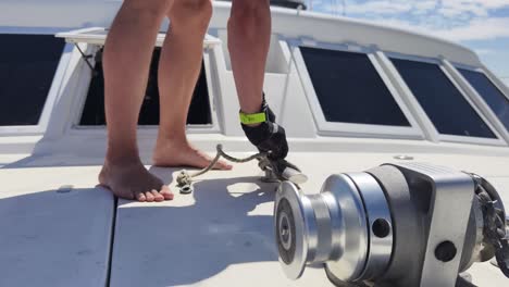 sailor mooring a boat