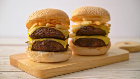 hamburger-or-beef-burgers-with-cheese-and-french-fries---unhealthy-food-style