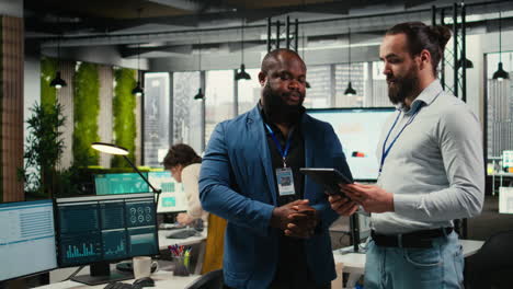 vertical video businessmen analysts monitoring efficiency insights at the workspace