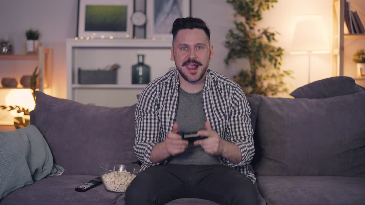 Man Playing Video Games at Home