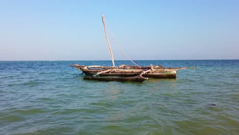 a traditional boat at diani beach - galu beach - kenya, africa