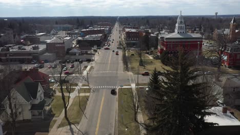 downtown charlotte, michigan skyline with drone moving up