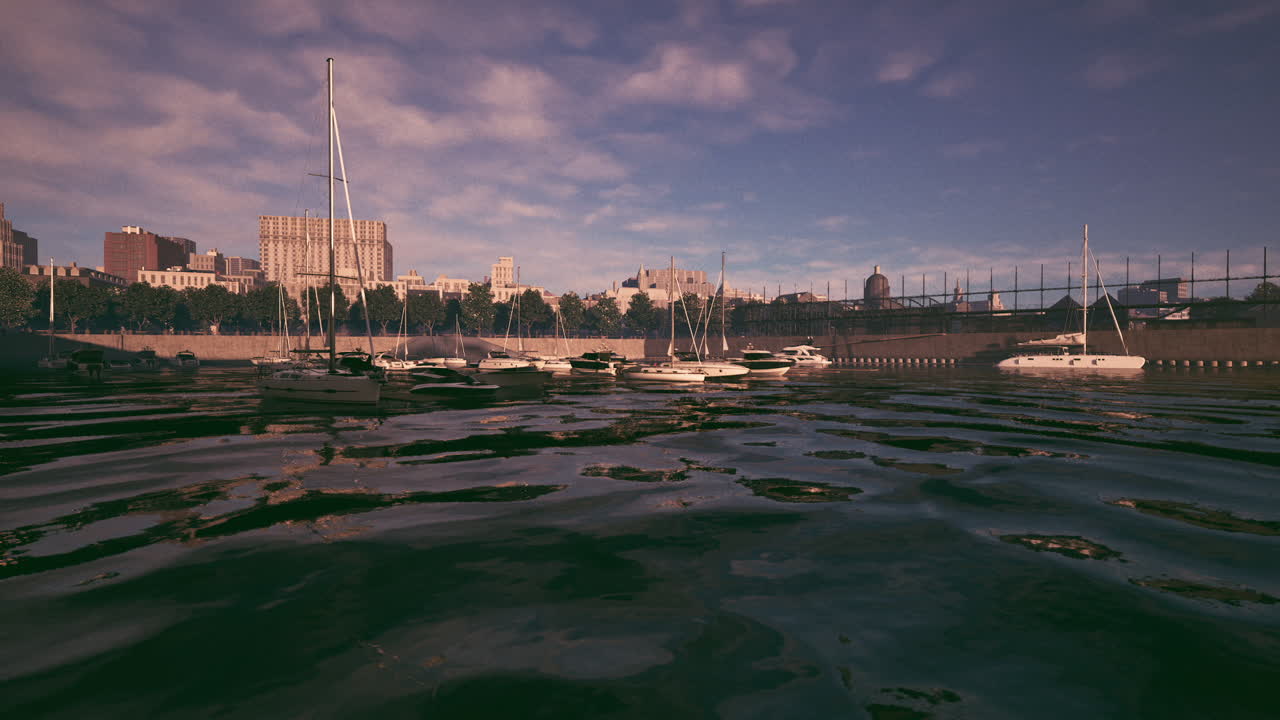 도시 스카이 라인 근처의 조용한 해안가에서 저류에 정박한 보트