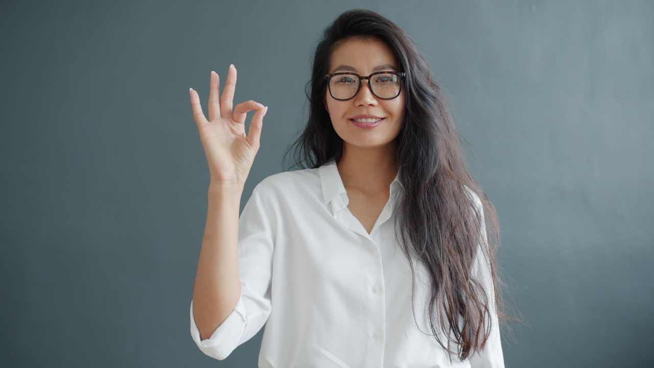 Woman giving an ok sign