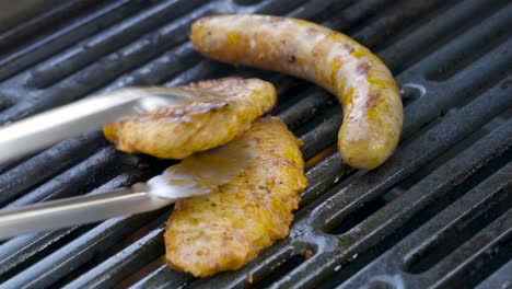 preparing fresh meat on a gas bbq grill