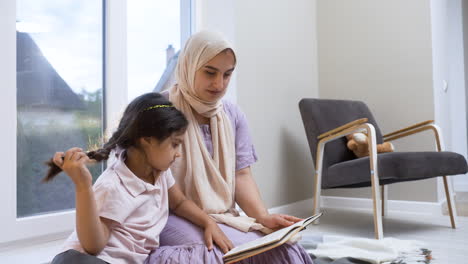 mother and daughter in the living room.