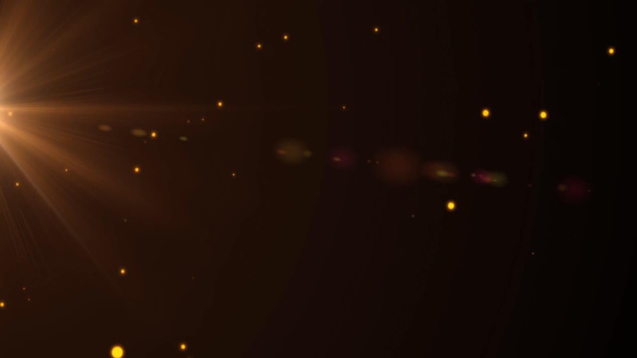 Animation of multiple glowing yellow spotlights moving on black background