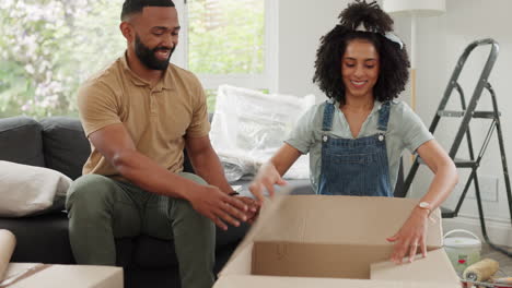 Black-couple,-moving-out-and-tape-box