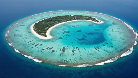 breathtaking aerial view of a stunning tropical island surrounded by crystal clear blue waters and vibrant coral reefs, perfect for relaxation and exploration