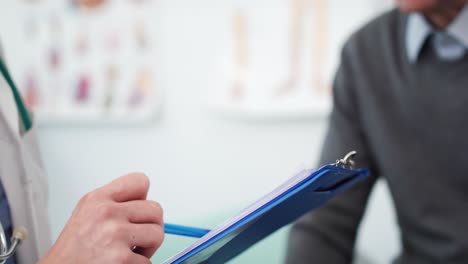 Handheld-view-of-doctor-asking-about-illness-of-her-patient