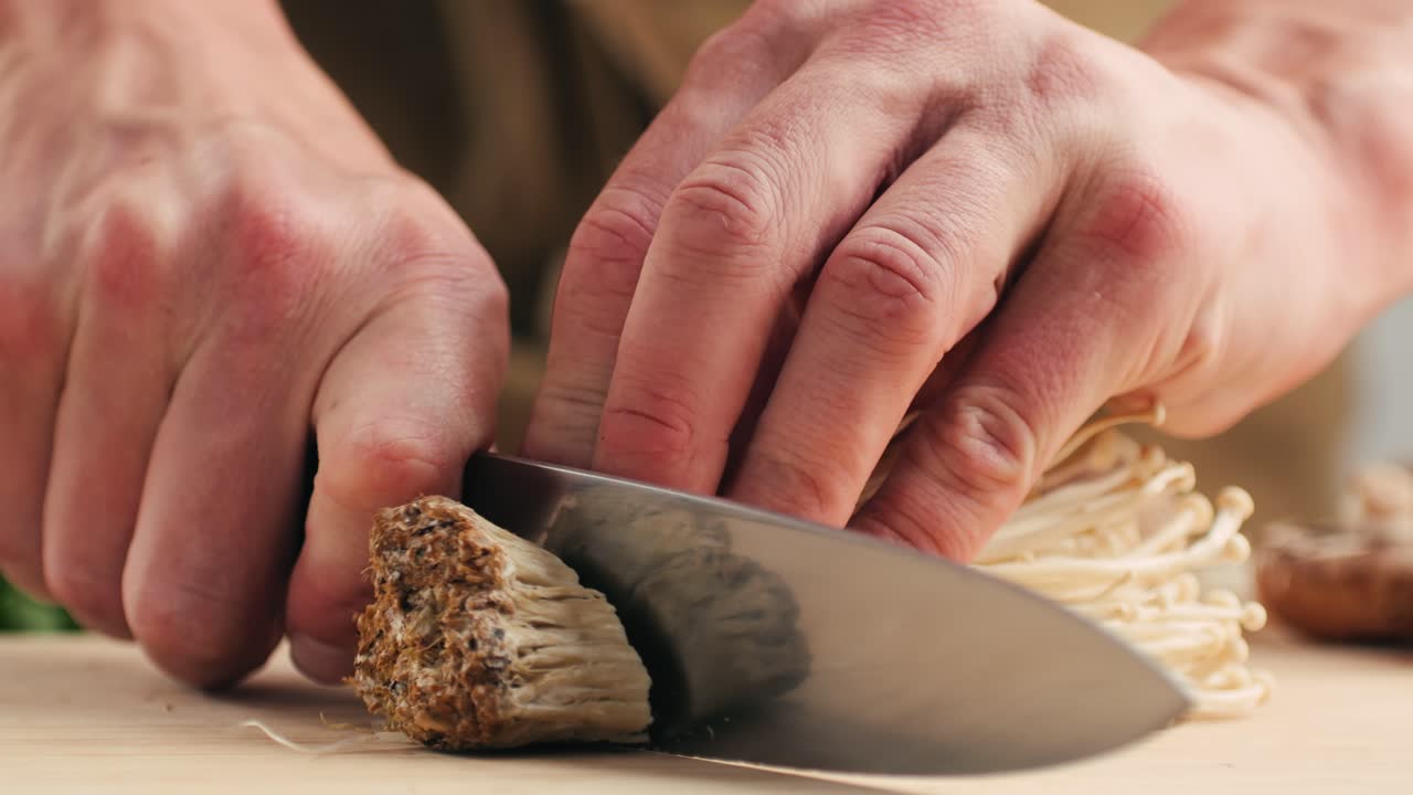 Chef Cutting Enoki Mushrooms