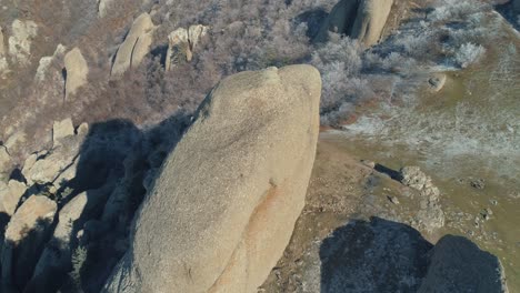 winter aerial view of rocky mountain formations