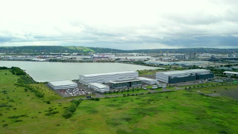slow rising wide aerial video gv of studio ulster, a virtual production film studio in belfast, northern ireland. filmed in 4k, 30fps and with rec709 color
