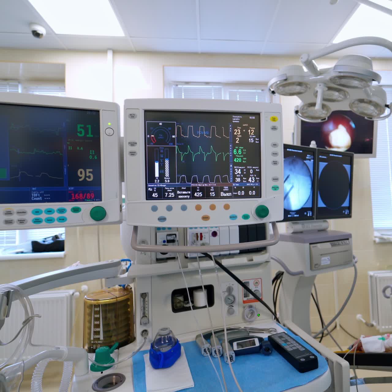 Contemporary medical equipment in the reanimation. New technology to show patient's condition in the intensive care unit. Monitors and artificial ventilation in clinic.