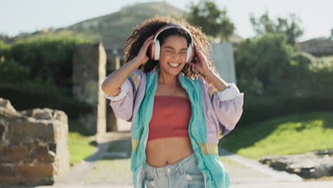 Dance,-energy-and-headphones-with-a-woman-walking