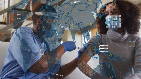 animation of world map over biracial doctor vaccinating patient