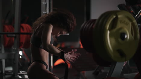 close-up portrait of a sexy dancer in lingerie and oil. a woman dances in the gym. beautiful athletic figure