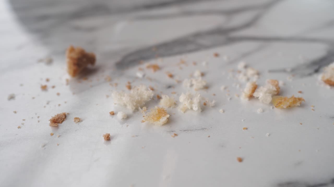 Bread Crumbs on Marble Surface