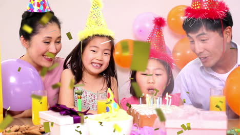 family celebrating a birthday party