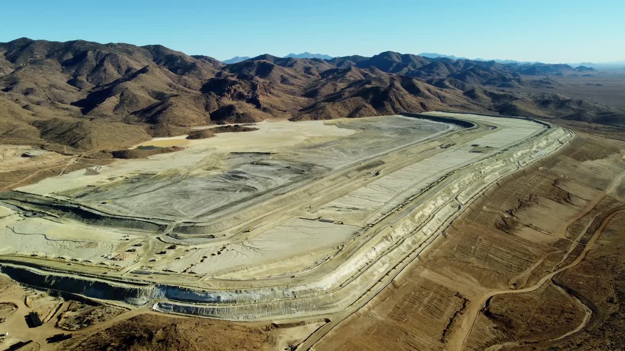 US, AZ, Kingman, Gross Spring Mine, 2025-01-14 - Drone view of a huge mining tailings pile from an open pit mine (not shown)