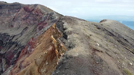 flying over a volcano side.