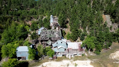 keystone south dakota abandoned mine and mill -aerial fly in