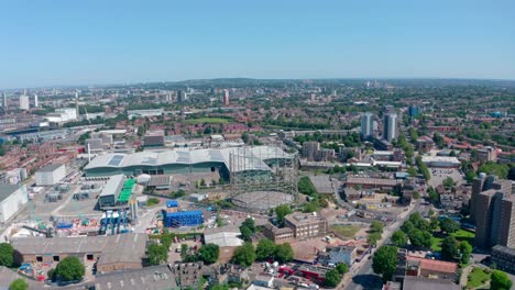 dolly forward drone shot over industrial south east london on a sunny day