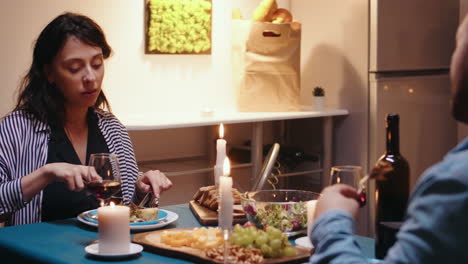 couple having festive dinner