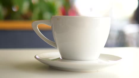 empty coffee cup on a table